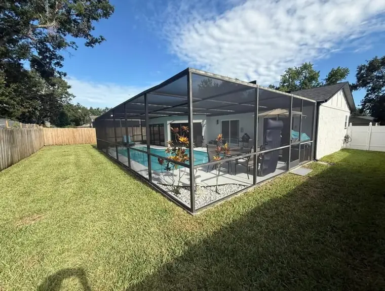 Fresh no-see-um screen mesh installed on a Florida lanai enclosure