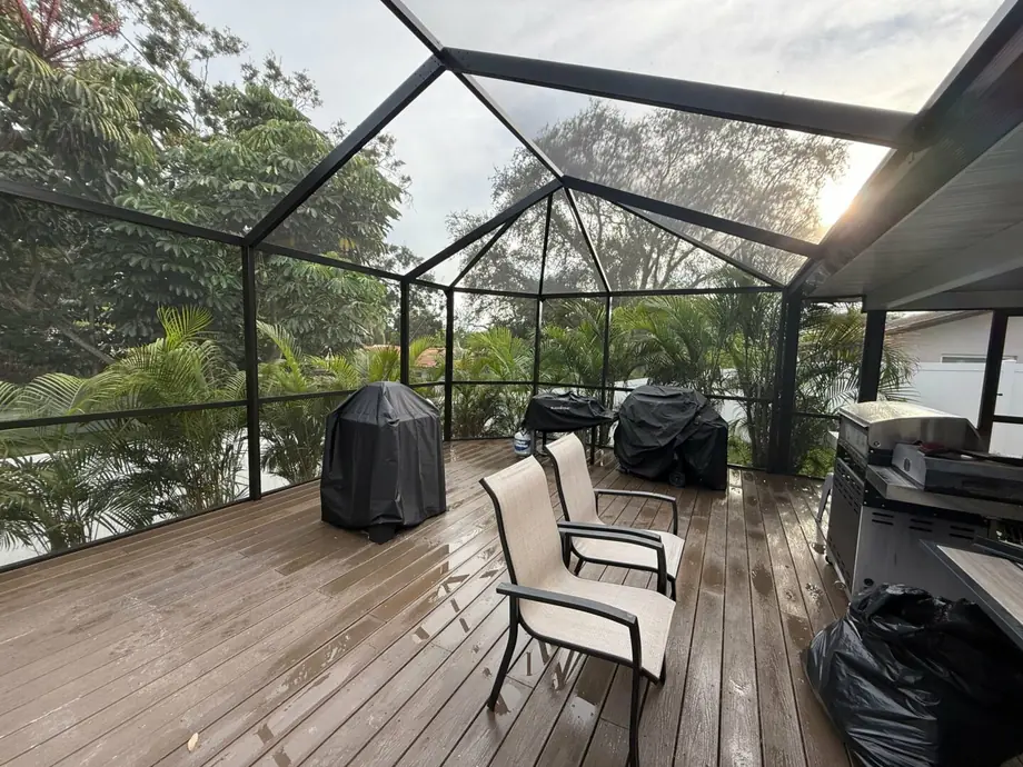 Aerial view of a completed pool enclosure and screened lanai